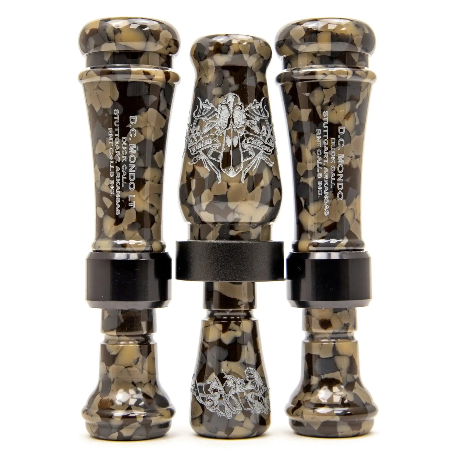 Three camouflage-patterned duck calls.