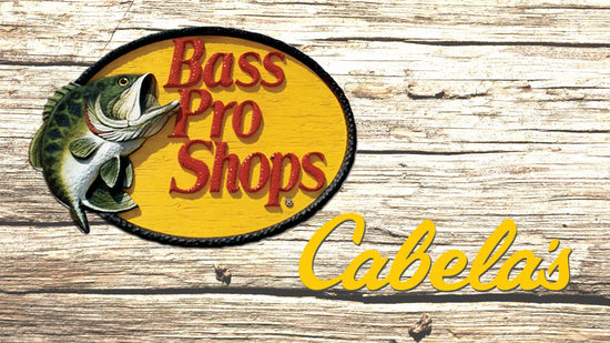 An oval Bass Pro Shops and Cabela’s brand logo with a fish design.