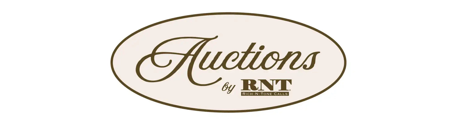An oval-shaped logo with a dark brown border and light cream interior.